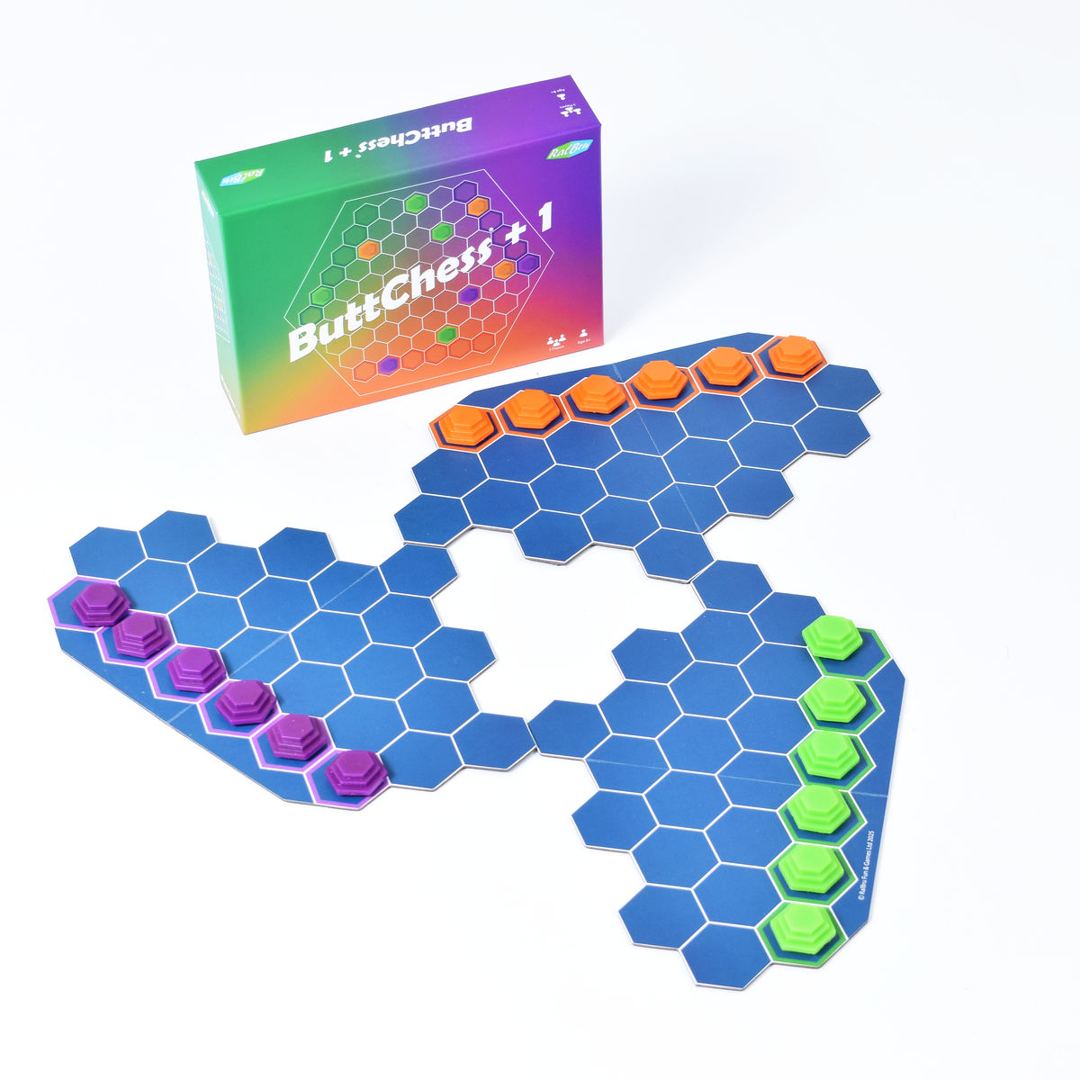 ButtChess +1 board game box with blue hexagonal board and orange, purple and green pieces, affordable three-player strategy game for all ages under £20